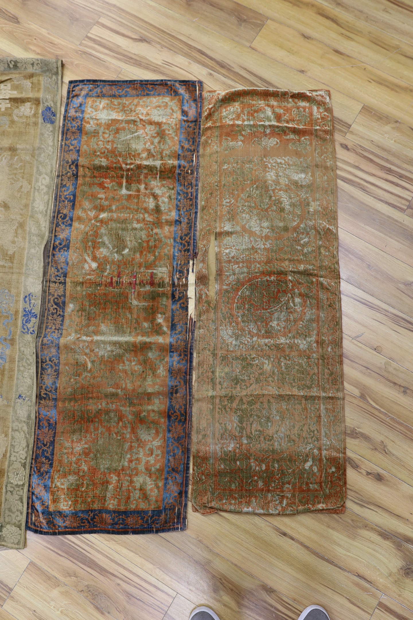A Chinese cut velvet panel and 3 runners